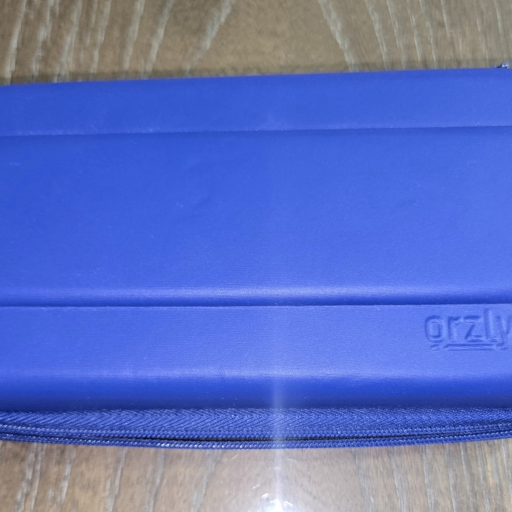 Nintendo Blue Gaming Console, Case, 1 Screen Protector, And Charger - Picture 3 of 3